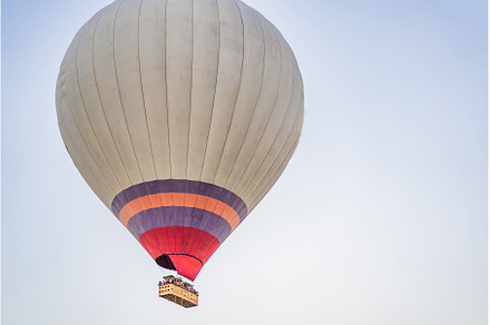 Beautiful hot air balloons over blue, a Transportation Photo by Elizaveta Galitskaya