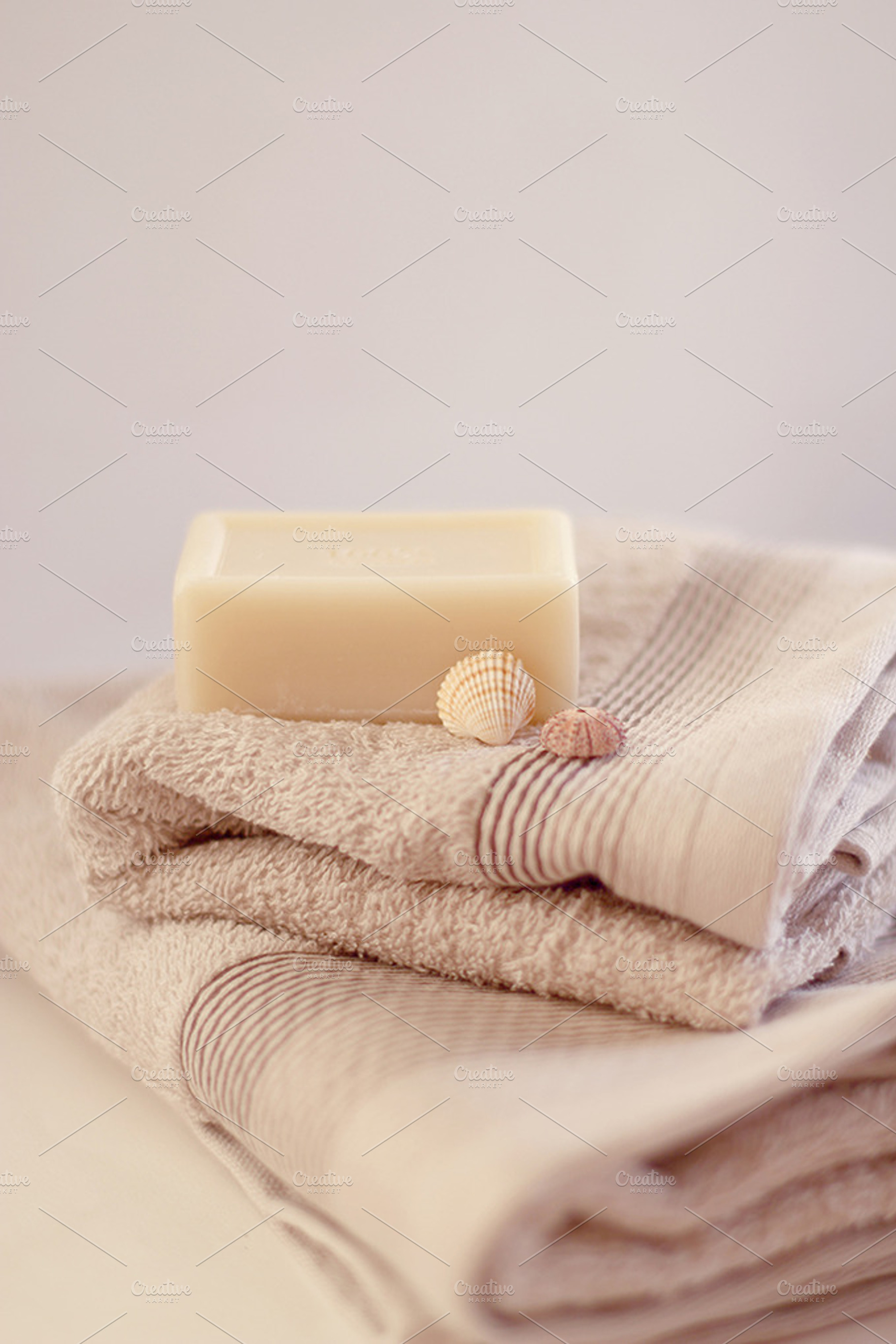 Spa towel featuring spa, towel, and shells