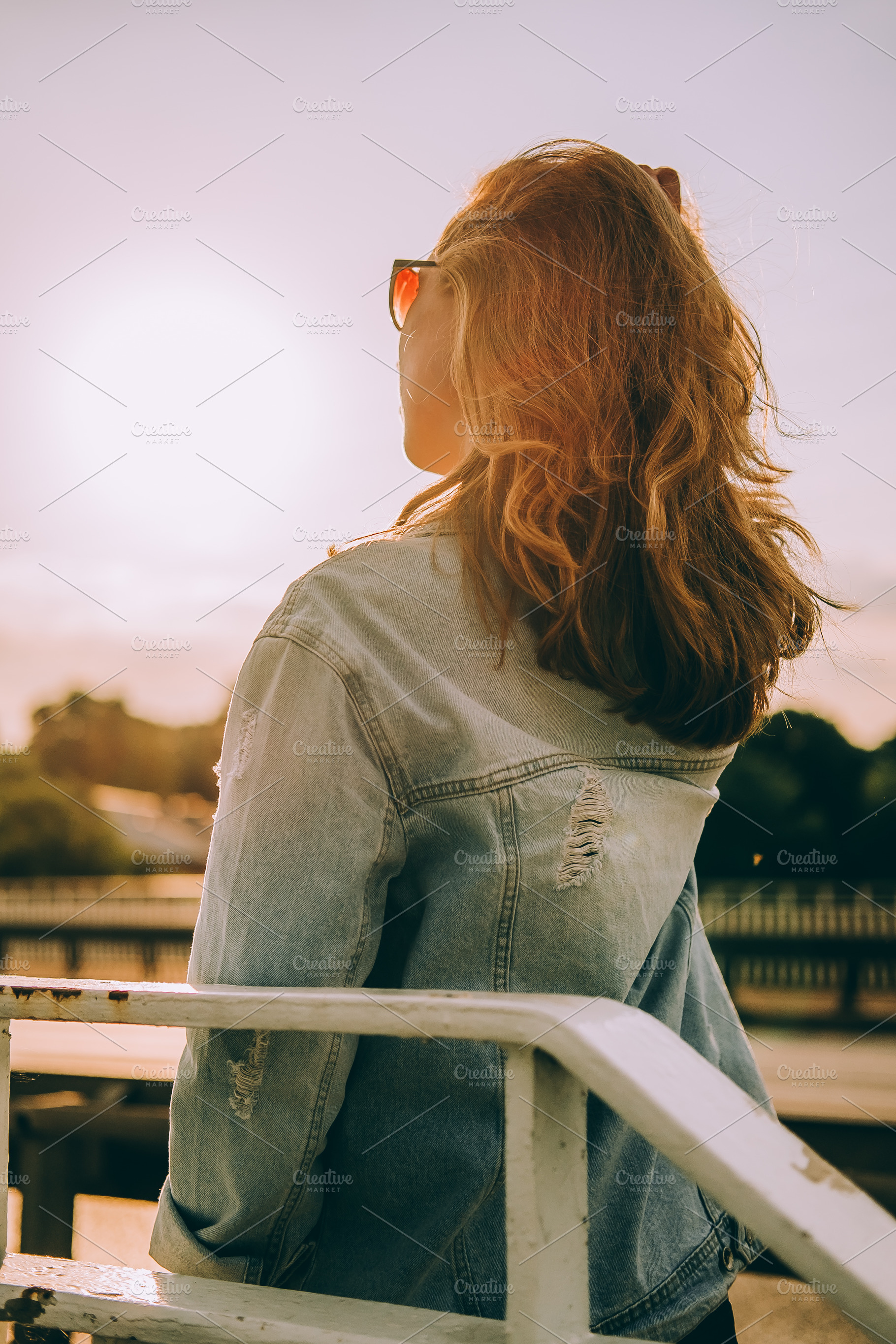 Girl in the rays of the setting sun, a Person Photo by Valeryia P.