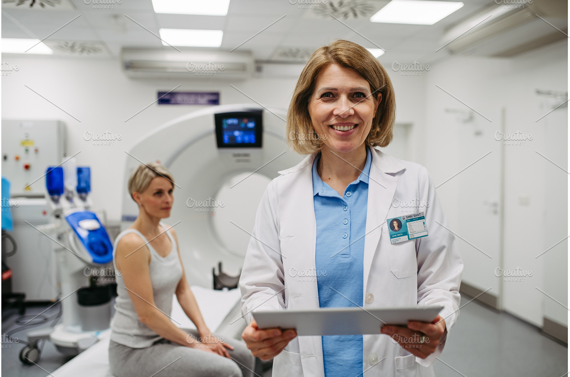 Portrait of doctor in front of CT, a Health & Medical Photo by HalfPoint