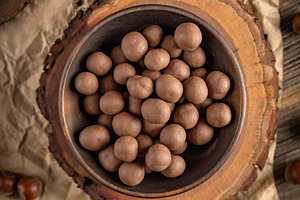 Chocolate covered hazelnuts, a Photo by Grafvision photography