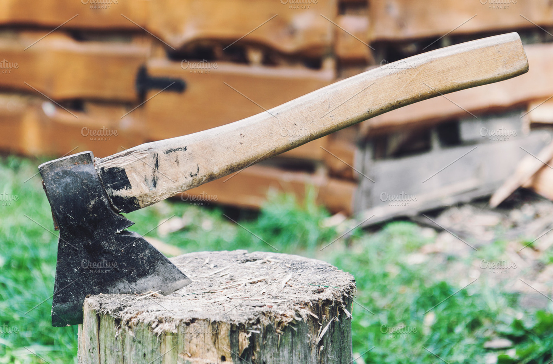 Axe in a log, an Industrial Photo by BOOCYS