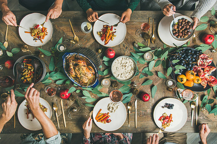 Friends or family eating at festive containing traditional, christmas, and, a Food & Drink Photo by Foxys