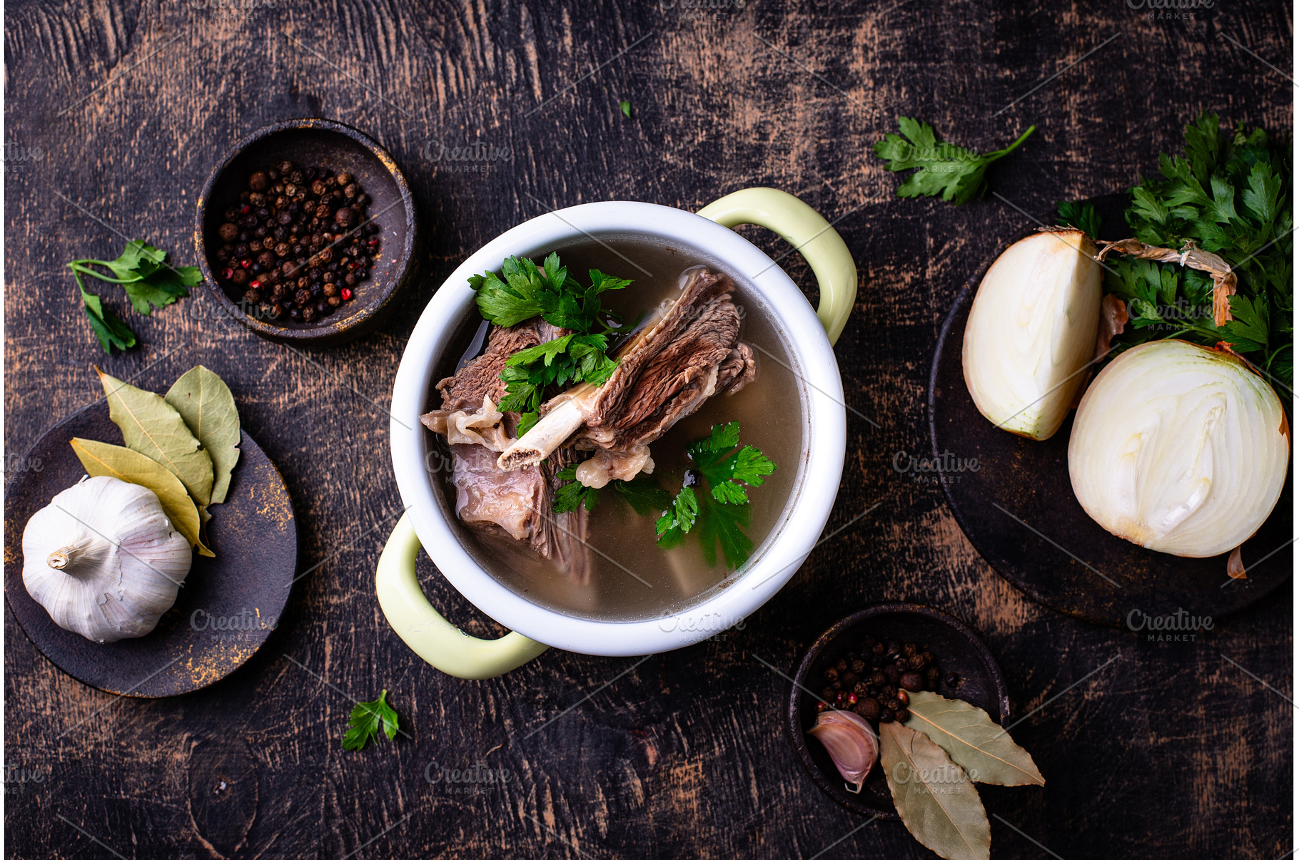 Boiled bone broth or bouillon with, a Food & Drink Photo by Yulia Furman
