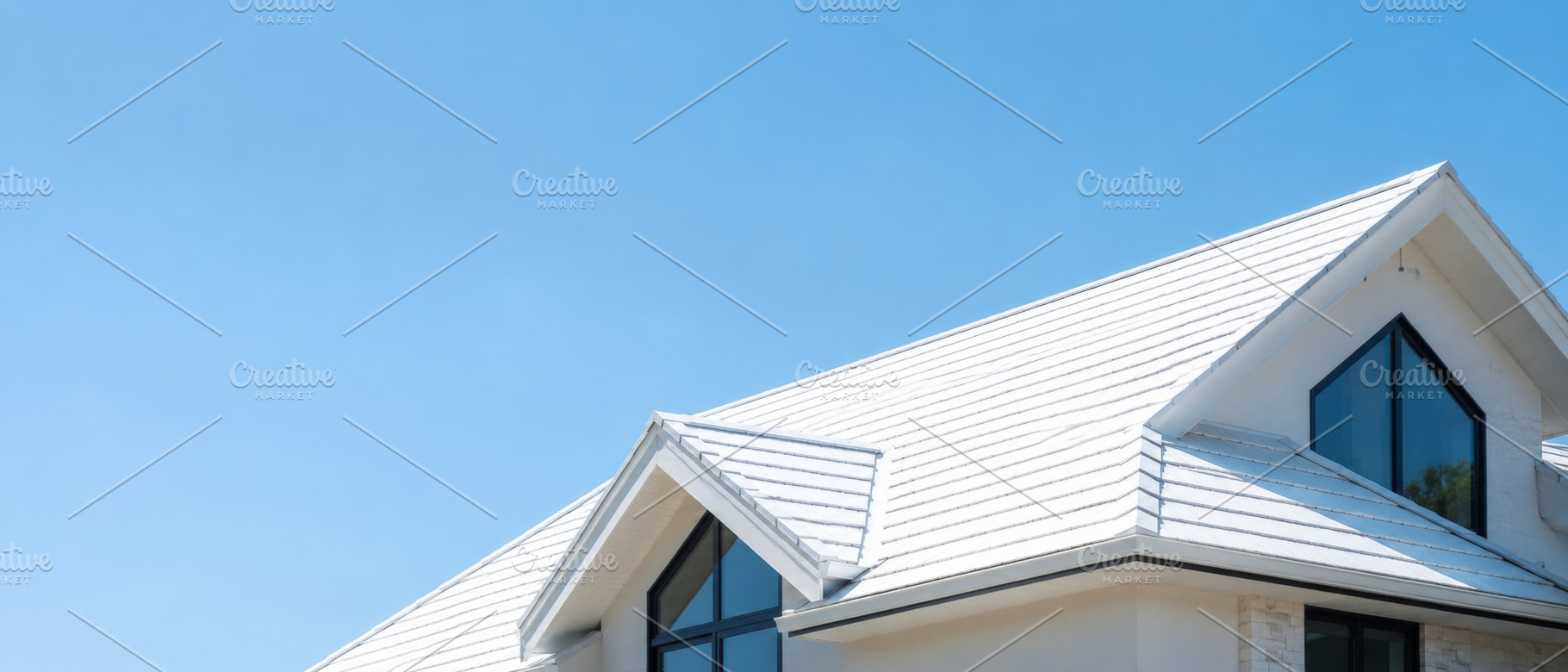 White house roof against blue summer, a Photo by Dvoevnore photos