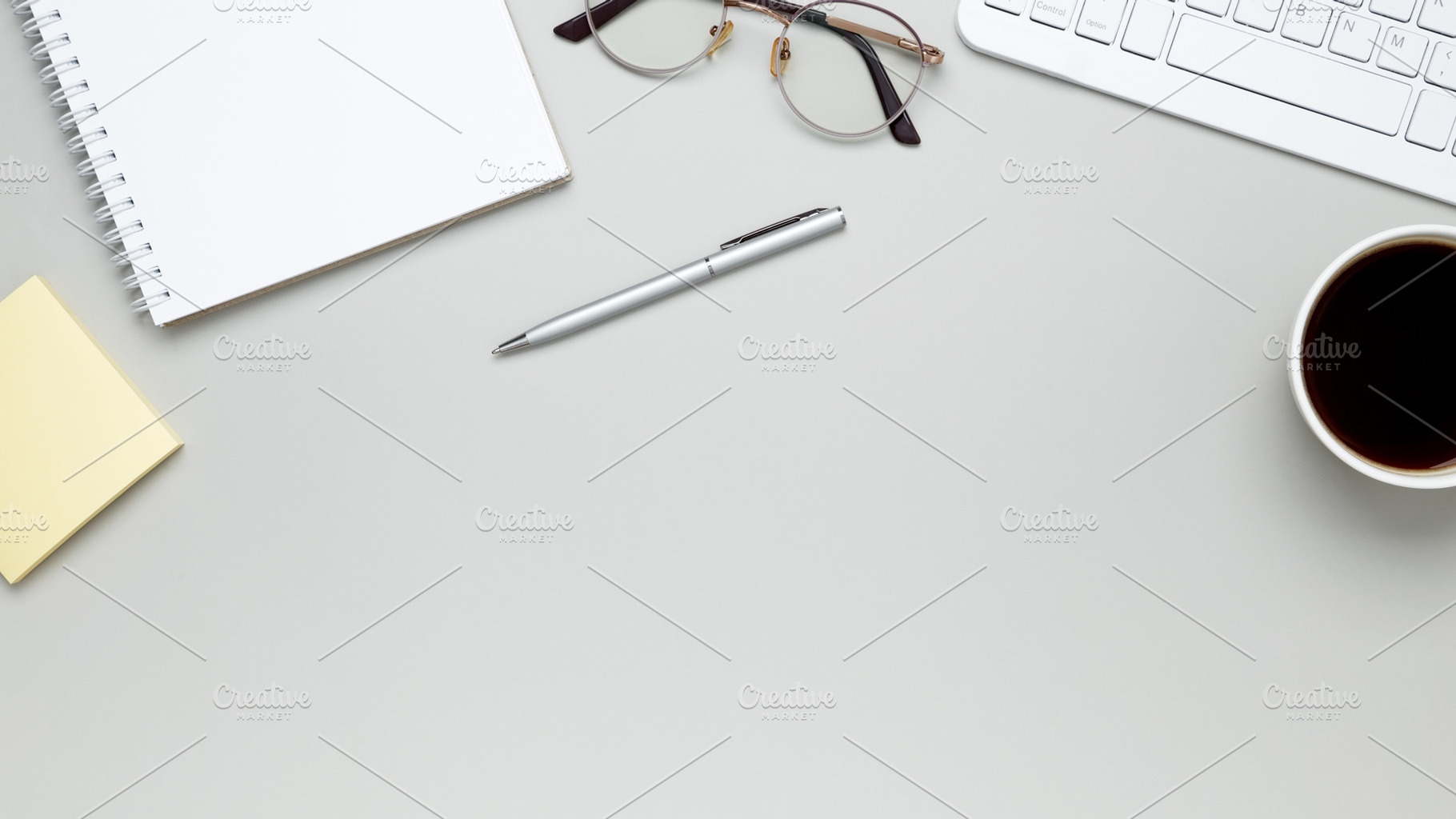 Minimal work area with stationery items and writing materials, a Photo by matucha