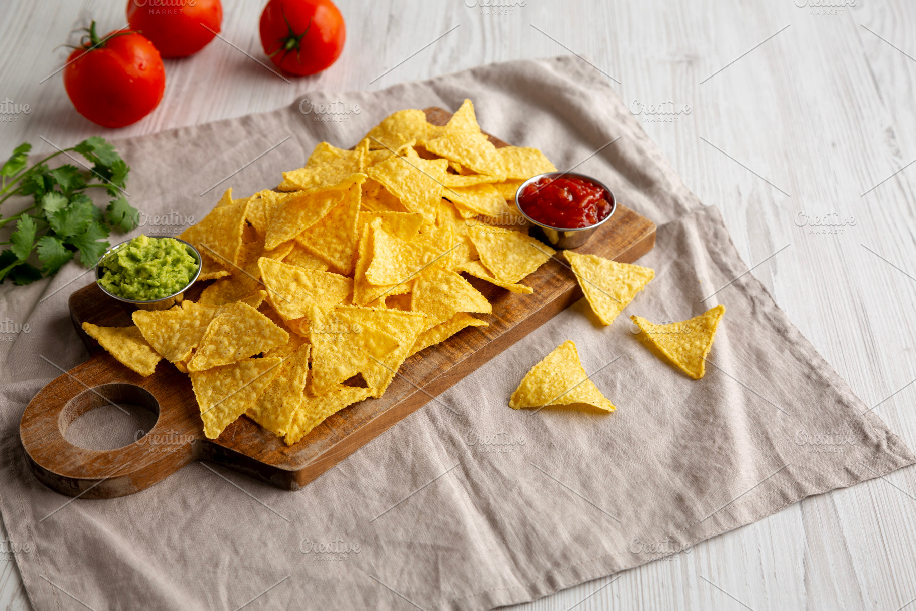 Homemade Corn Tortilla Chips with Tomato Salsa and Guacamole, a Food & Drink Photo by LiudmylaChuhunova