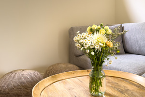 Flowers On Coffee Table, an Architecture Photo by THP Creative
