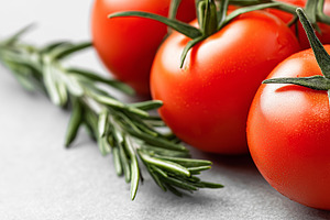 Fresh red tomatoes with green stems, a Food & Drink Photo by MistyDay