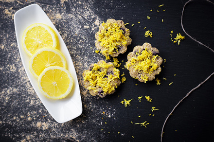 lemon cupcakes on a black background, a Food & Drink Photo by Artsaba Family