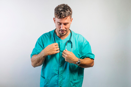 Doctor Adjusting His Stethoscope