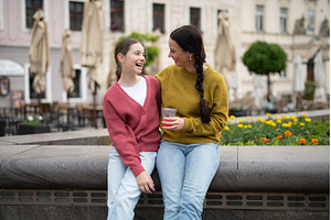 Daughter and mother laughing, a Person Photo by HalfPoint