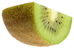Half of ripe kiwi in brown peel on isolated background, a Food & Drink Photo by ndanko