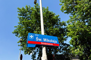 Street sign for Św. Mikołaja in Rzeszow Poland with blue sky a, a Photo by AS photostudio