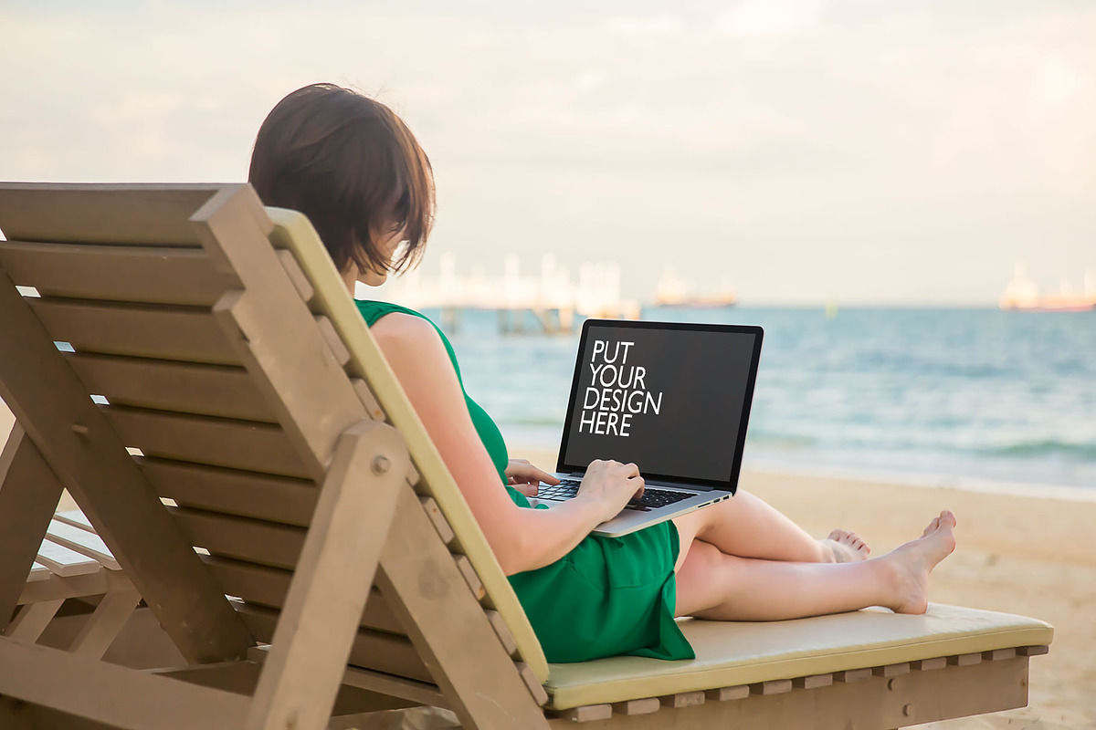 Girl on the Beach with Laptop, a Mac Mockup by UI Kitchen (Photo 5 of 6)