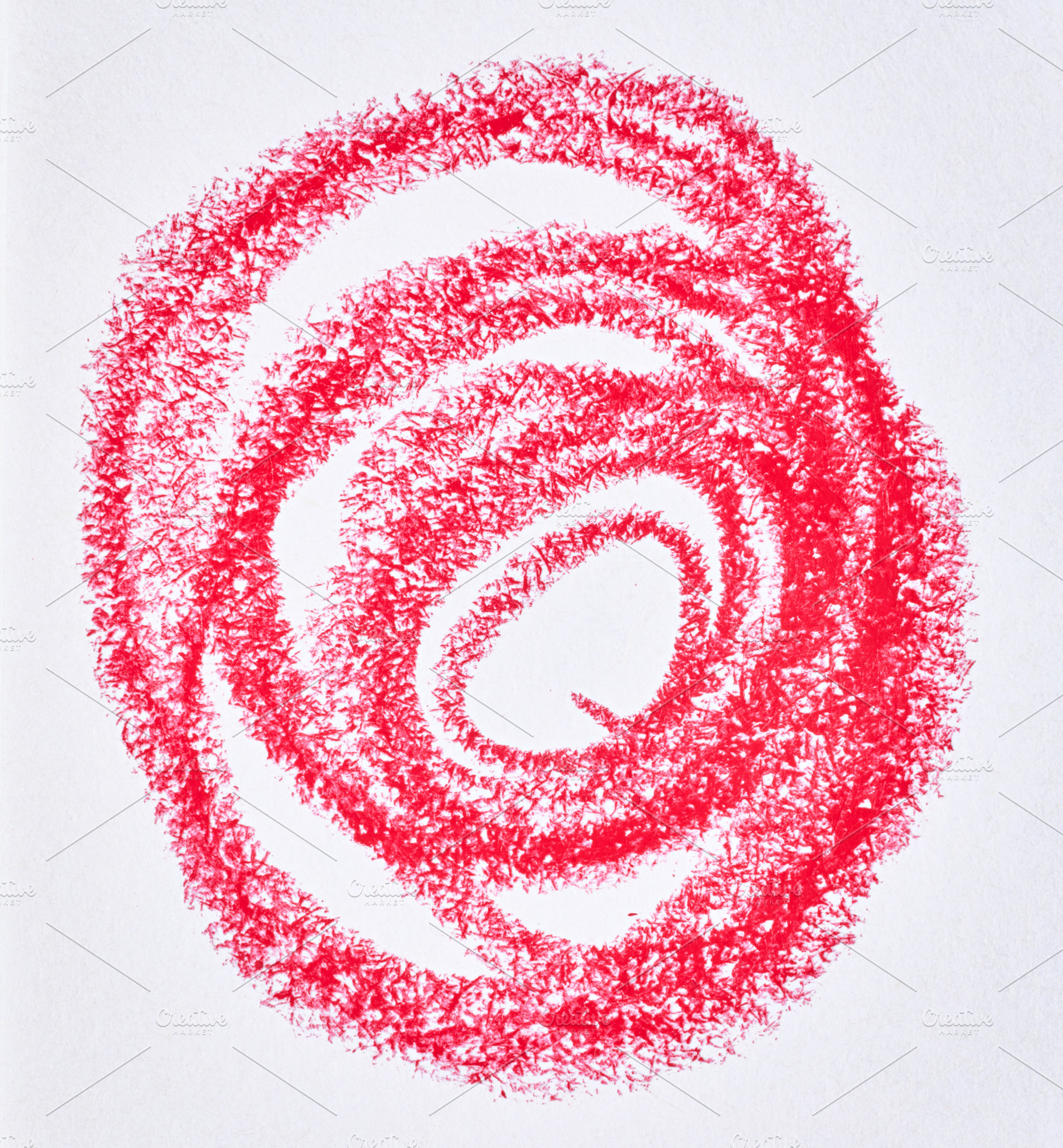 A red circular spiral drawn with a wax crayon or pencil on white, an Abstract Photo by ndanko