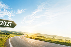 Road sign pointing to 2027 with scen, a Photo by Dvoevnore photos