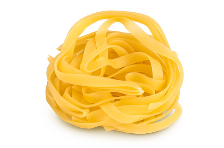Raw tagliatelle pasta isolated on, a Food & Drink Photo by NataPhoto