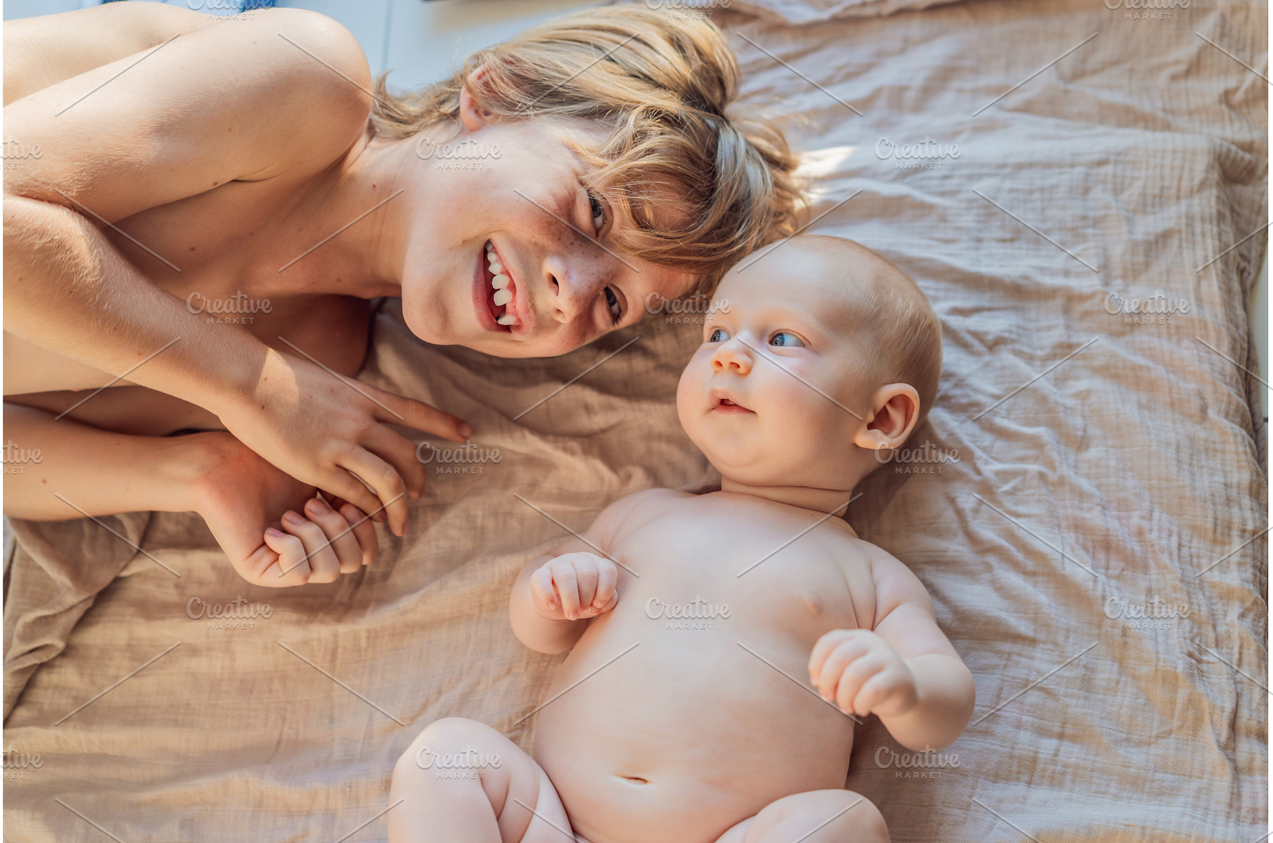 Older and younger baby brothers, a Person Photo by Elizaveta Galitskaya