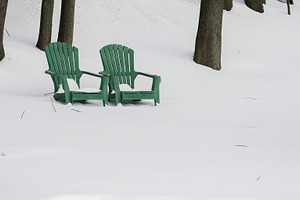 Chairs sit in a snowy area surrounde, a Nature Photo by 1miromiro