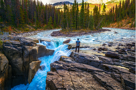 Hiker at the f Upper Sunwapta Falls, a Nature Photo by Nick Fox