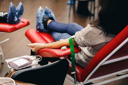 The donor blood donates blood in the clinic containing blood, donor, and