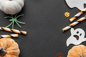 Halloween pumpkins ghost spiders and party straws
