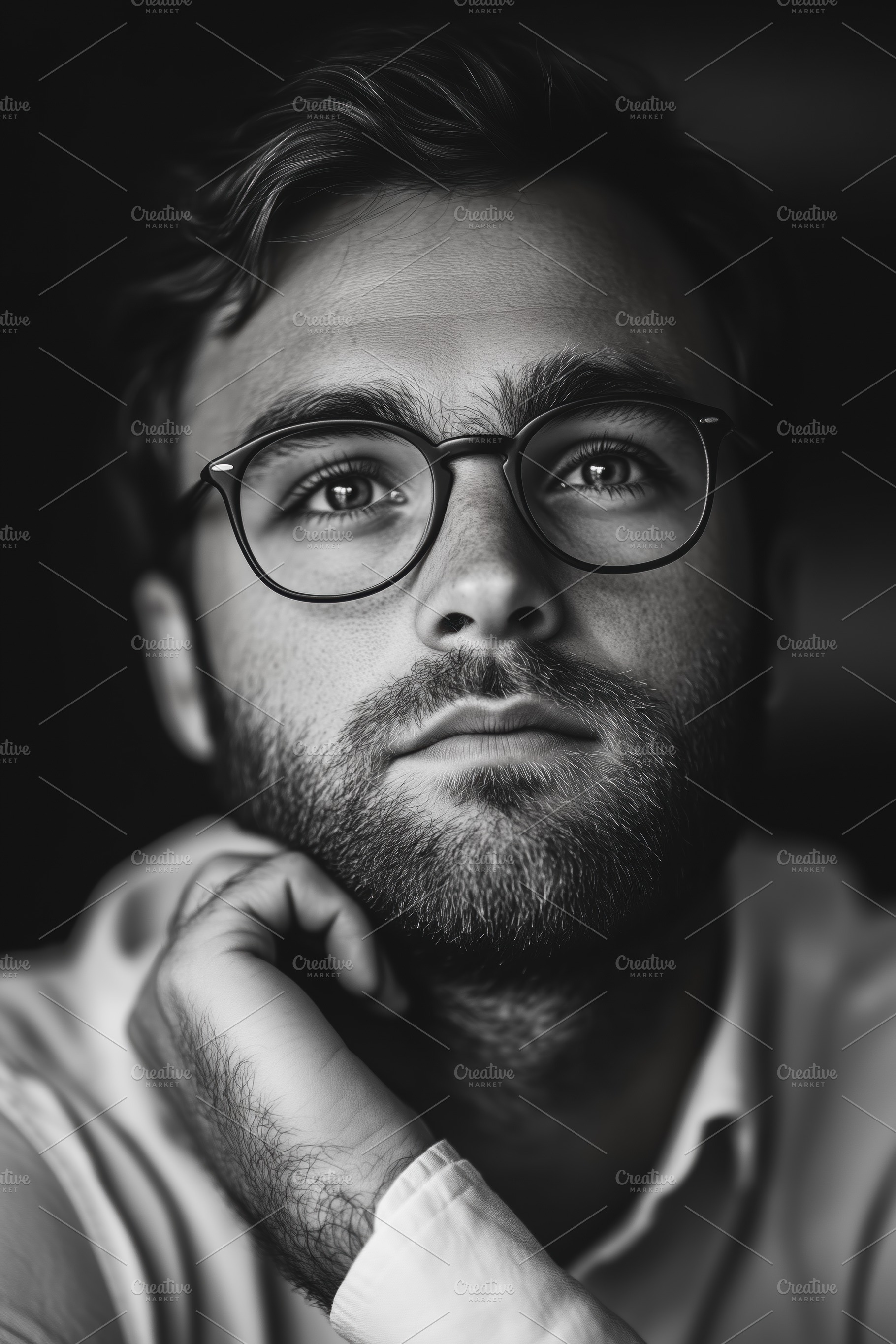 A close-up cognitive psychologist portrait of a young man with glasses, deep in, a Person Photo by Textures & Backgrounds