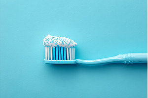 Toothpaste is applied to a blue, a Health & Medical Photo by ZinetroN
