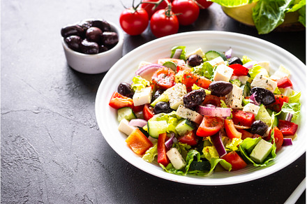 Greek salad with olives at black., a Food & Drink Photo by Nadia-nb