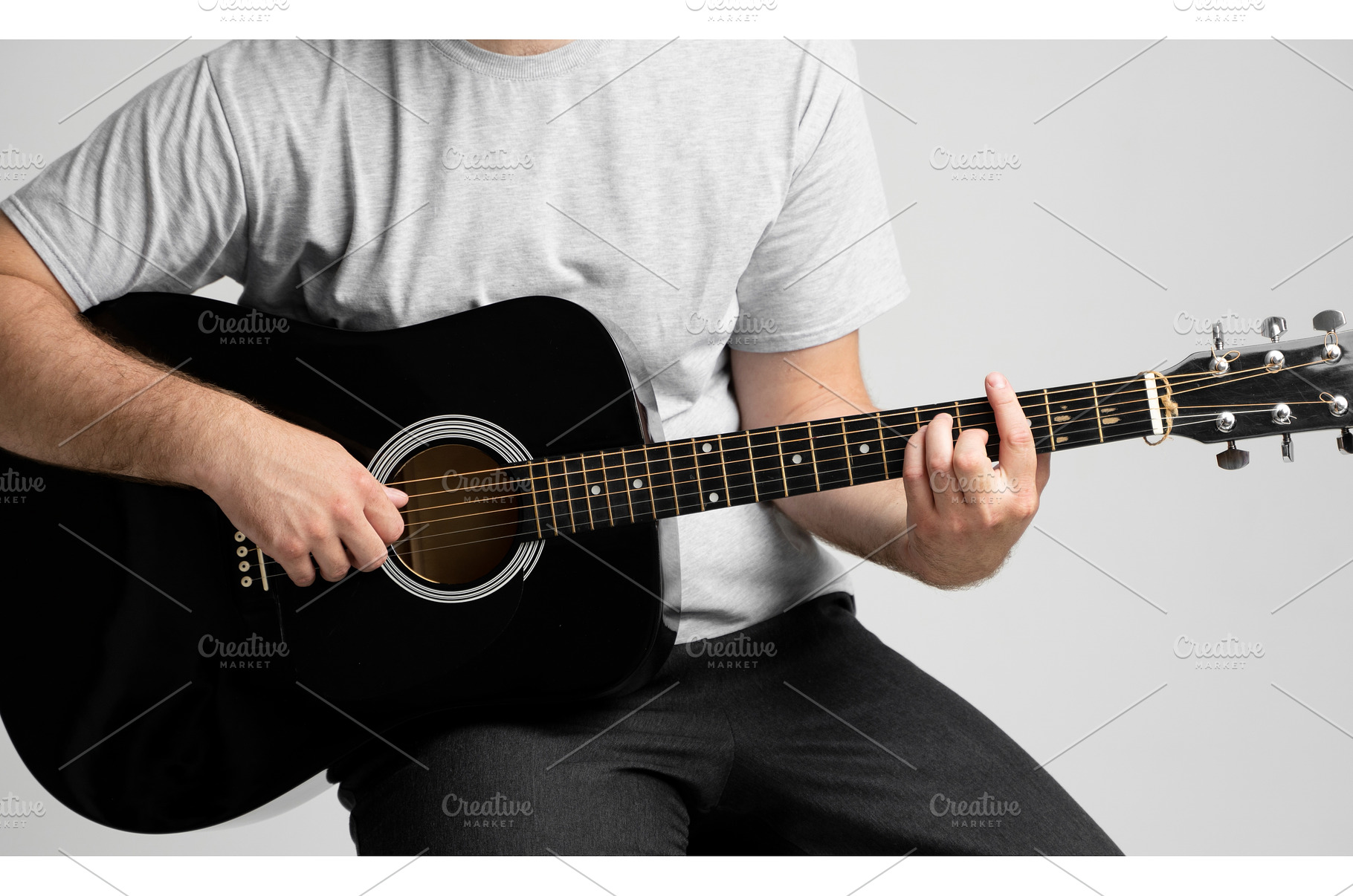 Man with a guitar in hands playing a, a Person Photo by volodymyrshtun13795
