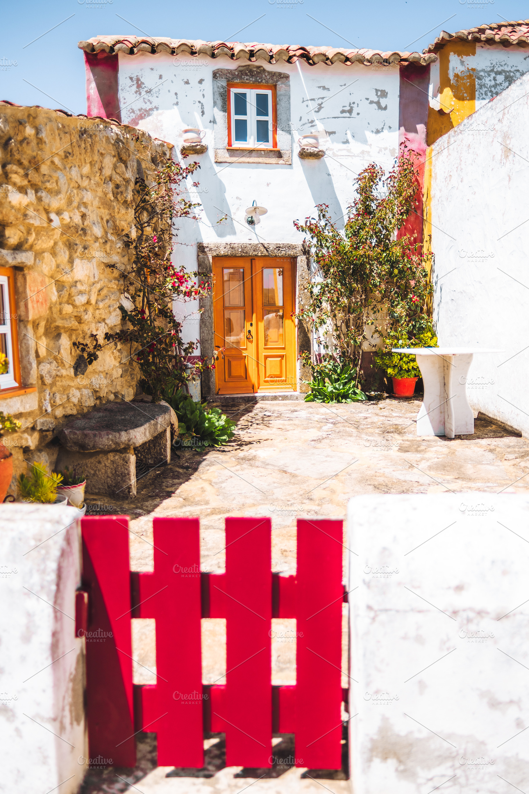 Rustic house with red gate, an Architecture Photo by SkyNext