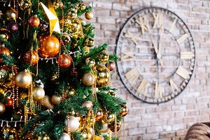 Decorated christmas tree in gold and stock photo containing ball and bauble