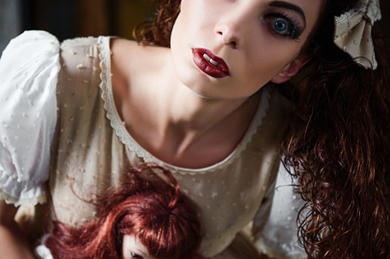 Strange girl with dolls, a Person Photo by Jetrel