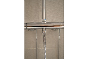 Chrome shower mixer faucet with a, an Architecture Photo by volodymyrshtun13795