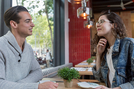 Couple Meeting In Busy Café Restaurant, a Person Photo by RF Images