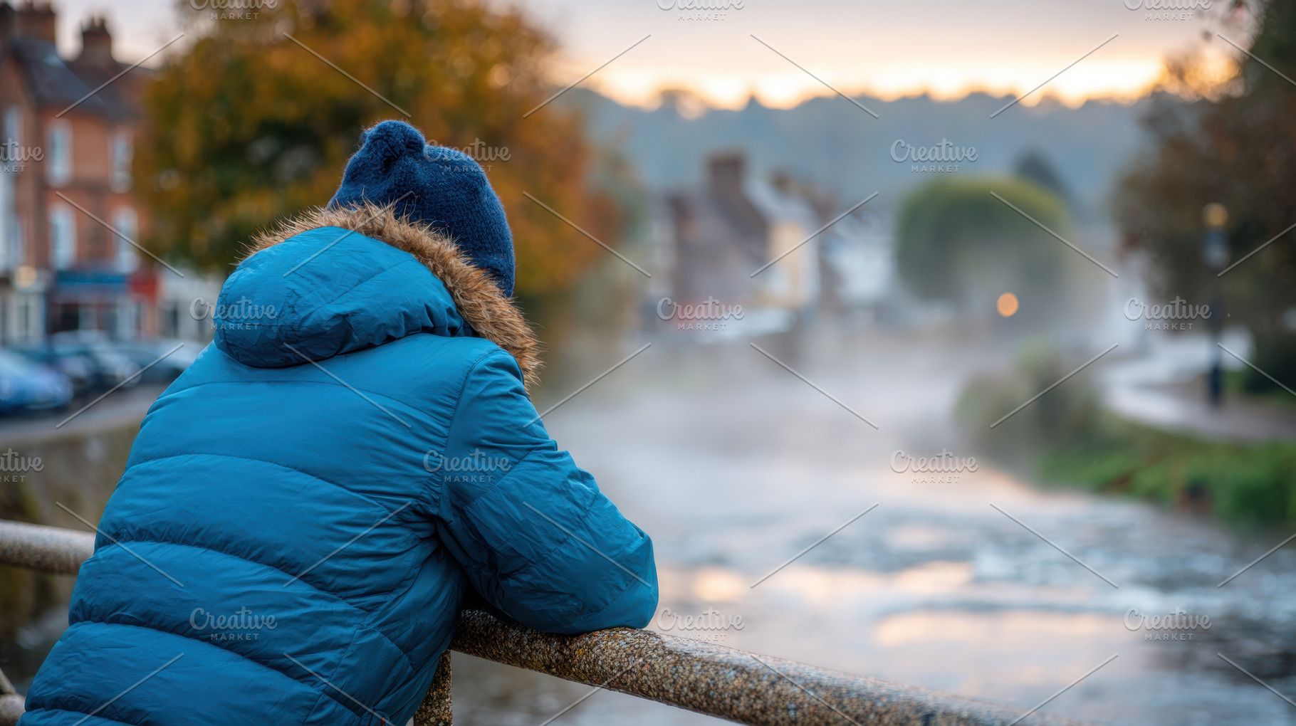 Contemplative moment by the river at sunrise, a Person Photo by AlyaAnd