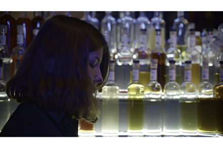 Young female bartender at nightclub, a Person Photo by Media Whale Stock