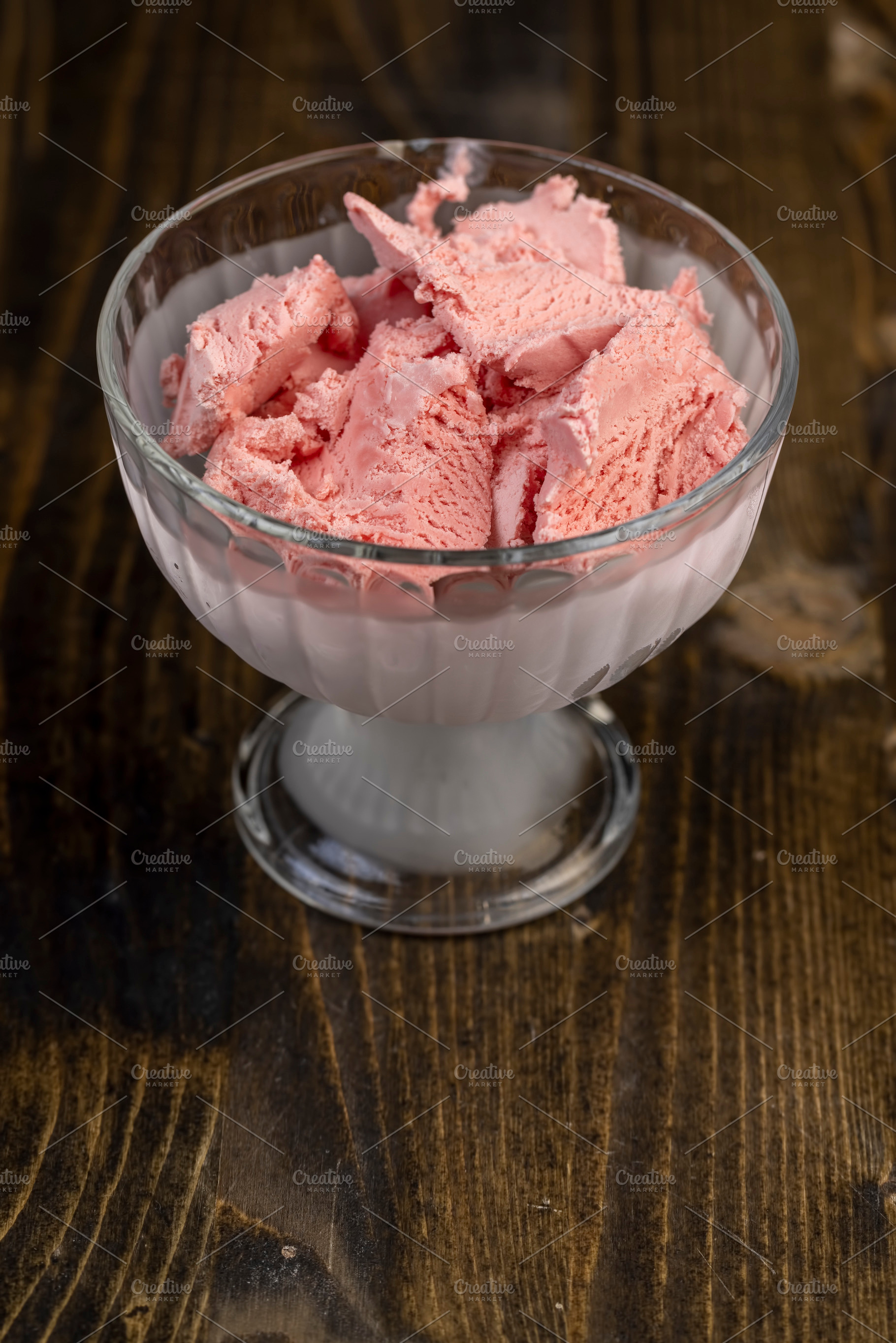 ice cream with berry flavor and smell, natural ice cream with added strawberry, a Photo by rsoollAI
