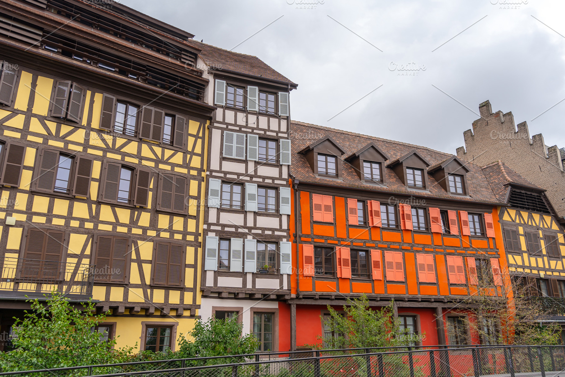 Facades of colorful half-timbered houses in Strasbourg, France, an Architecture Photo by GoodGoods