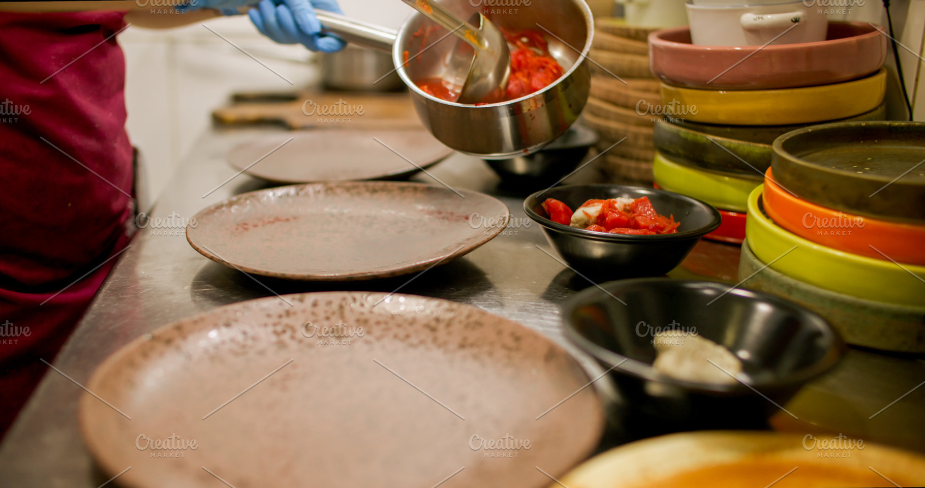 Ladling food portioned dish pouring meal bowl chef, a Food & Drink Photo by Photo Drive Studio