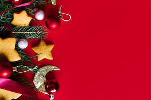 Festive holiday flatlay with Christmas gingerbread cookies, red
