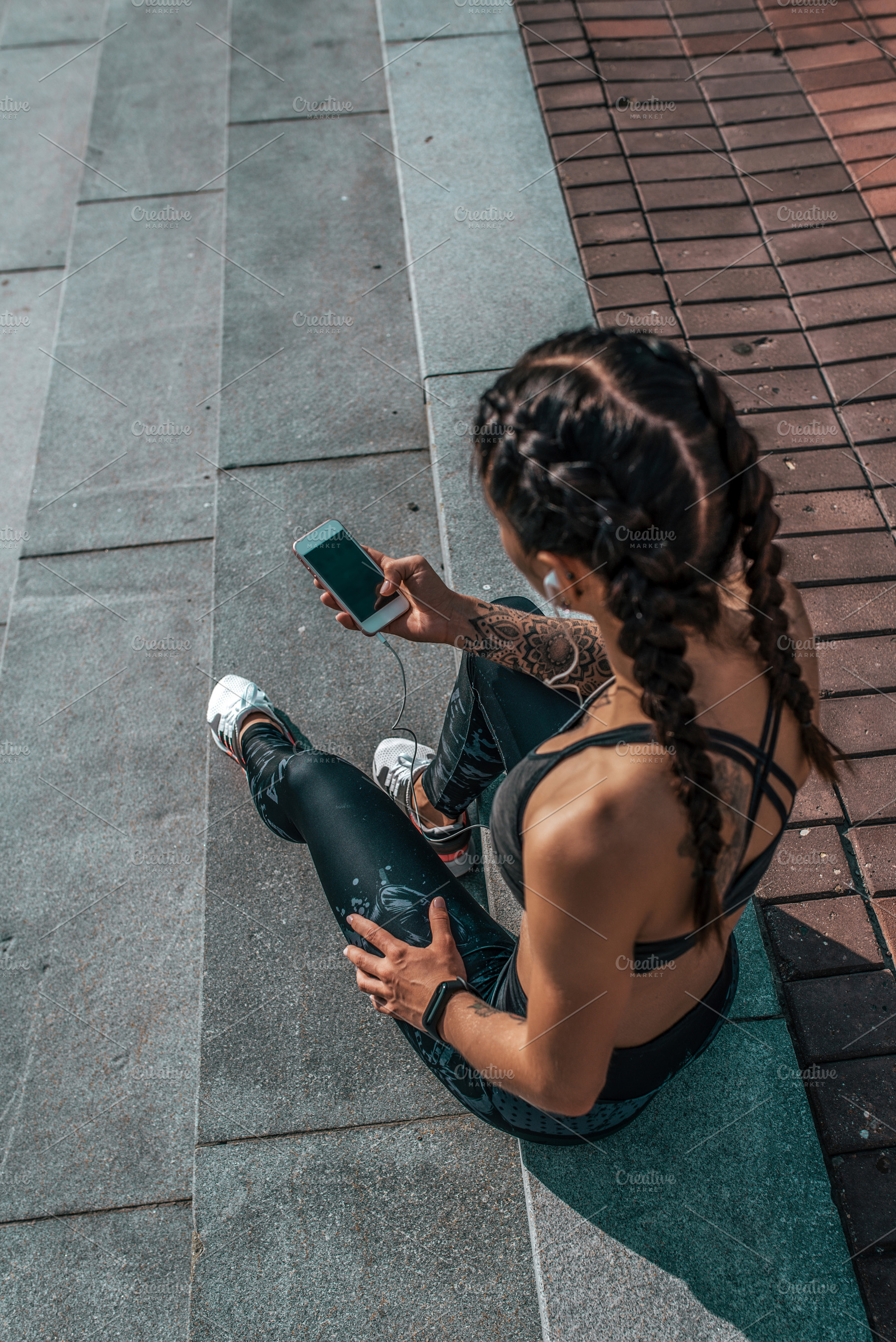 Girl athlete sitting steps resting containing phone, woman, and sport, a Sports & Recreation Photo by byswat