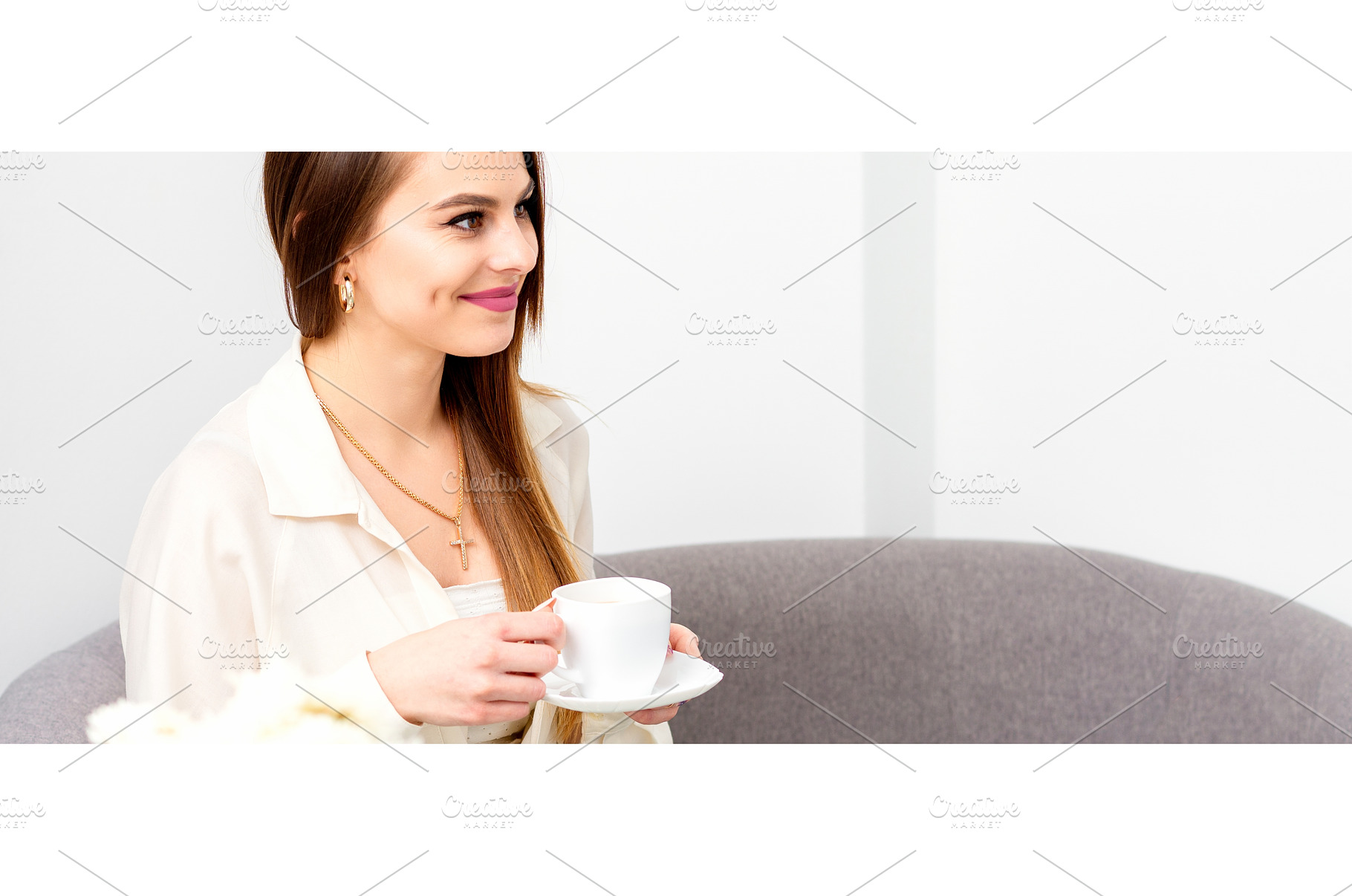 Female caucasian client with a cup, a Person Photo by okskukuruza