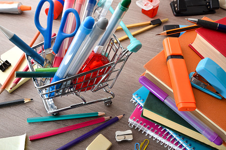 School supplies shopping with mini cart and supplies