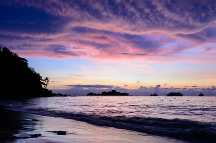 Sunrise on the beach containing beach, sunrise, and sea, a Nature Photo by yongkiet jitwattanatam