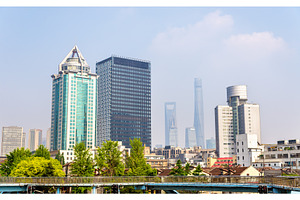 Skyscrapers in shanghai featuring city, architecture, and building, an Architecture Photo by Leonid Andronov