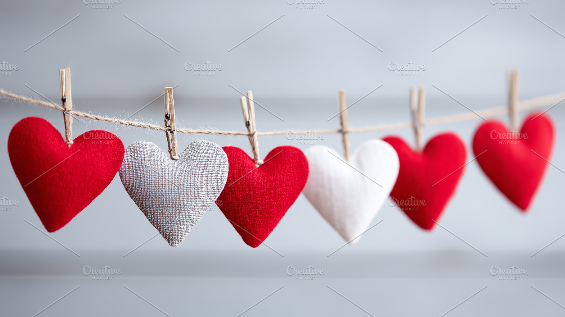 Colorful fabric hearts hanging on a, a Holiday Photo by MistyDay