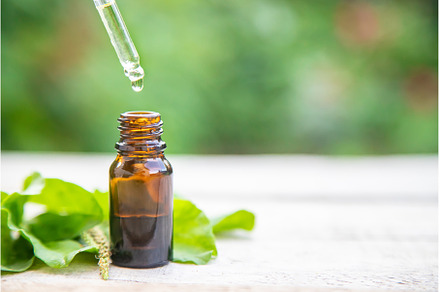 Plantain extract in a small bottle, a Nature Photo by yanadjana