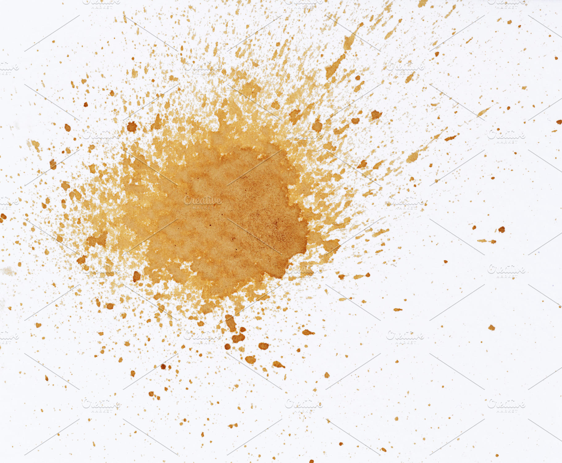 A large stain and small splashes of coffee on white paper, an Abstract Photo by ndanko